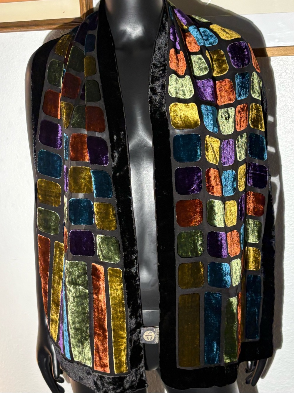Cocoon House silk velvet scarf. Colorful geometric jewel-tone square pattern.